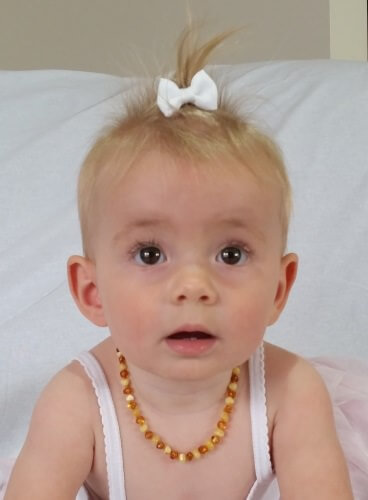 baby ruby with amber teething necklace